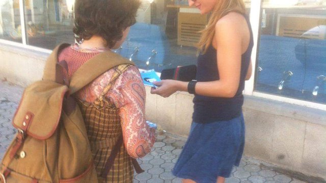 Our organizers try to spread the information about Film Festival by sticking our stickers and giving information papers to citizens.